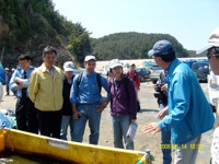 36B Korean Institute official explaing the great results of OSE II bioremediating the Bunker C oil in the test container at Mo Hnag harbor along with 